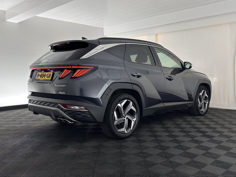 Hyundai Tucson 1.6 T-GDI PHEV Comfort Smart 4WD (INCL.BTW) *LEATHER | FULL-LED | ADAPTIVE-CRUISE | HEATED-COMFORTSEATS | KEYLESS | CAMERA | DIGI-COCKPIT | PRIVACY-GLASS | SHIFT-PADDLES | ECC | PDC | 19''ALU*