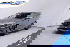 Volvo V60 - 2.4 D5 Twin Engine AWD navigatie lederen bekleding lane-assist stoelverwarming private-glas 18"lmv xenon cruise-controlle bliss botswaarschuwing