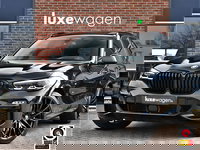 BMW X5 - xDrive40d M-Sport 7pers Pano Luchtv ACC Trekh H/K HUD 22inch 4WS Comf-seat