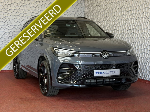 Volkswagen Tiguan - 1.5 eHYBRID 272 PK NW AUTO R-LINE VW.TREKHAAK BLACK PANO XL.NAVI STOEL/STUUR VERW. BLACK.STYLE 360.CAM ELEK.KLEP MATRIX.LED 20''LMV MASSAGE SCHUIFDAK PHEV PLUG IN HYBRID ✅Top Auto's Wijchen , 30 Jaar Specialist in Volkswagen  : Alle Type's : R-Line Editio