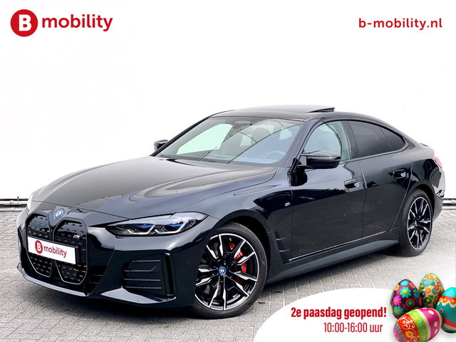 BMW i4 - M50 544Pk High Executive 84 kWh Elektrisch verstelbare stoelen | Trekhaak 1600kg | Schuif/Kanteldak | Driving Assistant Professional | Harman Kardon Sound System | Head Up Display | Verwarmbaar stuurwiel | Interieurlijsten Carbon Fibre | Parking Assist.