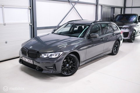 BMW 3 Serie Touring 318i Corporate High Exe | Dravitgrau | Trekhaak | Individual | Sportstoelen | CarPlay | NAP NL auto | rijklaarprijs |