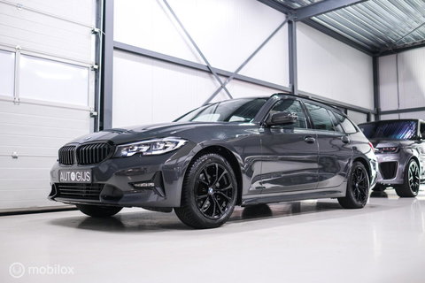 BMW 3 Serie Touring 318i Corporate High Exe | Dravitgrau | Trekhaak | Individual | Sportstoelen | CarPlay | NAP NL auto | rijklaarprijs |