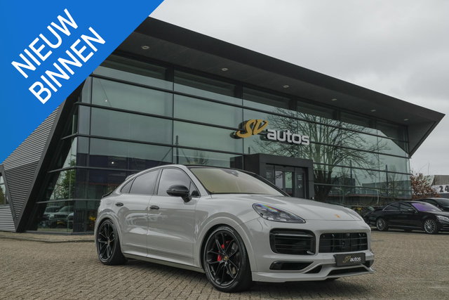 Porsche Cayenne - Coupé 3.0 E-Hybrid 462PK Krijtgrijs SportDesign Burmester Luchtvering *SOH 92%* Lightweight Package Carbon Dak 4-wielsturing NLauto