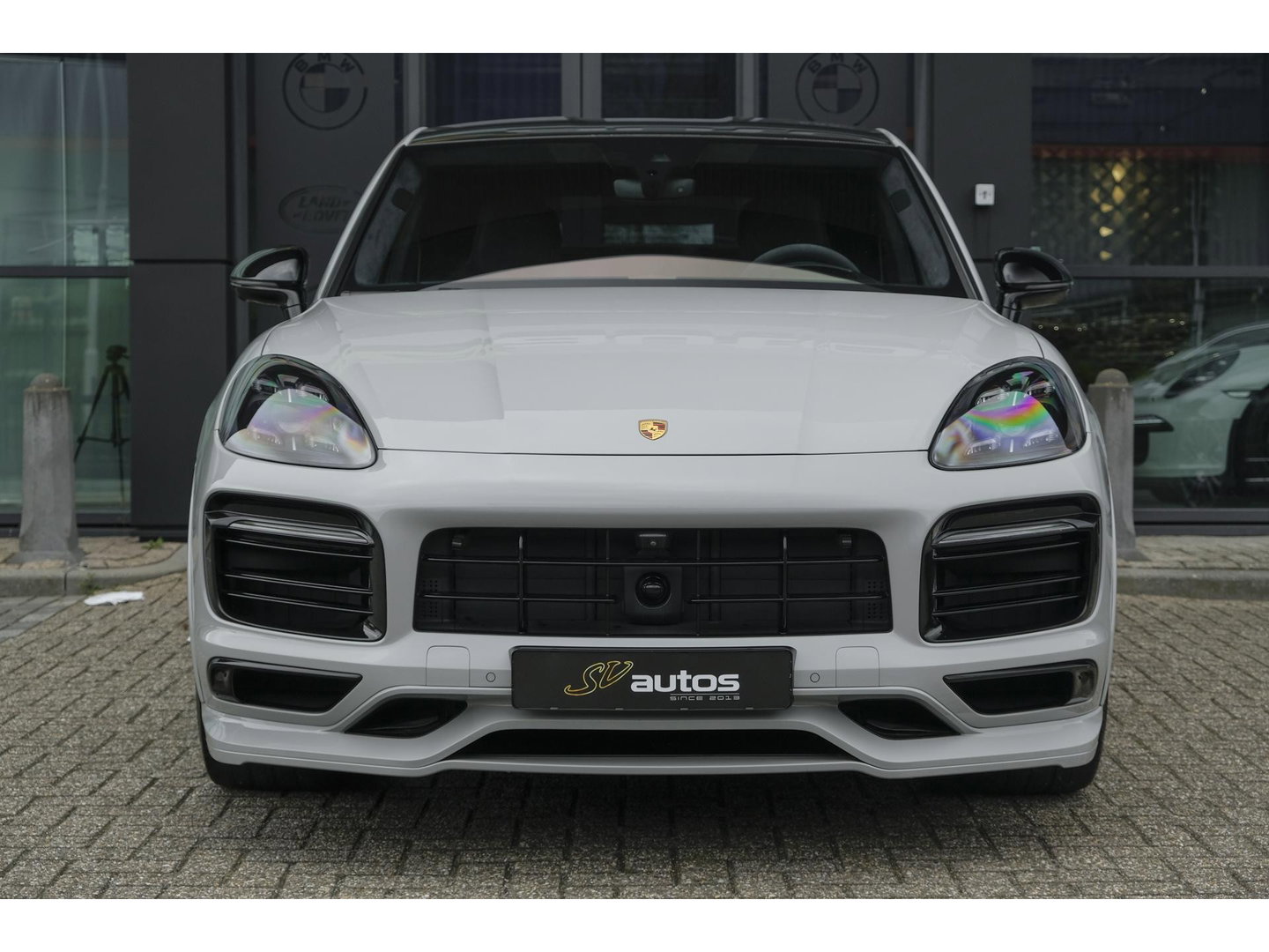 Porsche Cayenne Coupé 3.0 E-Hybrid 462PK Krijtgrijs SportDesign Burmester Luchtvering *SOH 92%* Lightweight Package Carbon Dak 4-wielsturing NLauto