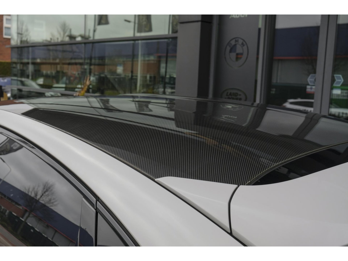 Porsche Cayenne Coupé 3.0 E-Hybrid 462PK Krijtgrijs SportDesign Burmester Luchtvering *SOH 92%* Lightweight Package Carbon Dak 4-wielsturing NLauto