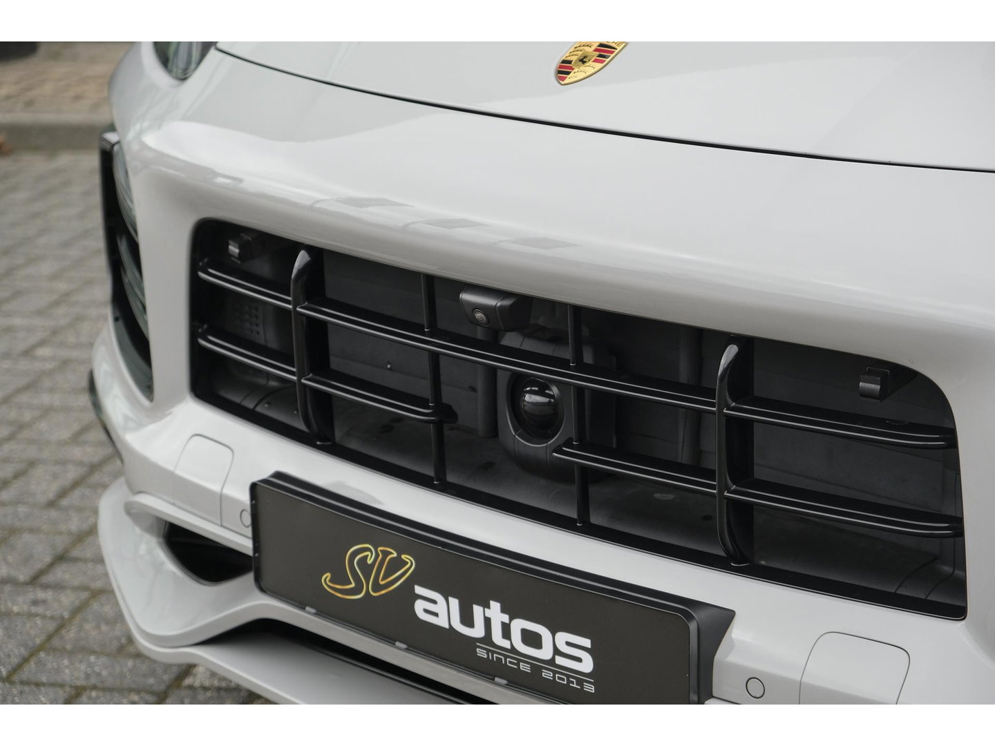 Porsche Cayenne Coupé 3.0 E-Hybrid 462PK Krijtgrijs SportDesign Burmester Luchtvering *SOH 92%* Lightweight Package Carbon Dak 4-wielsturing NLauto