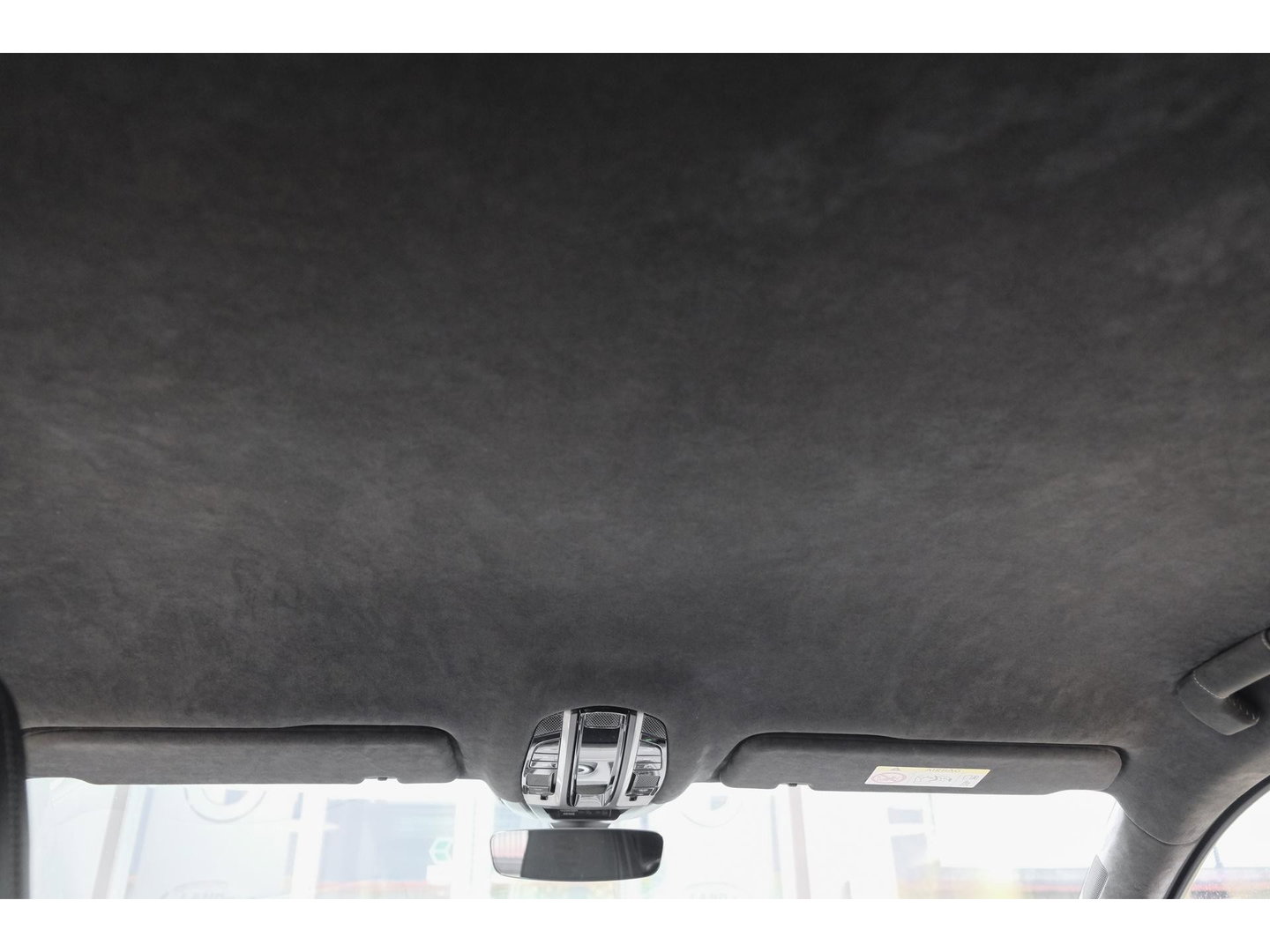 Porsche Cayenne Coupé 3.0 E-Hybrid 462PK Krijtgrijs SportDesign Burmester Luchtvering *SOH 92%* Lightweight Package Carbon Dak 4-wielsturing NLauto