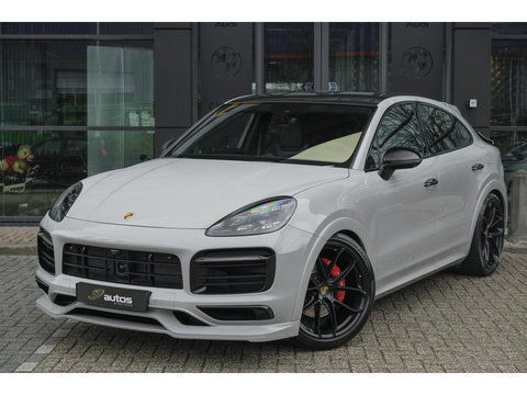 Porsche Cayenne Coupé 3.0 E-Hybrid 462PK Krijtgrijs SportDesign Burmester Luchtvering *SOH 92%* Lightweight Package Carbon Dak 4-wielsturing NLauto