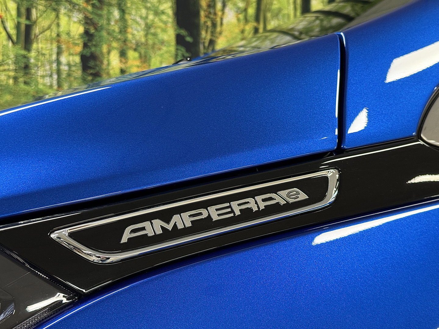 Opel Ampera-E Business executive 60 kWh | SOH 100% | Origneel Nederlands | Trekhaak | Apple Carplay | Android Auto | Stoelverwarming | Stuurwielverwarming | Bose | DAB | Camera |