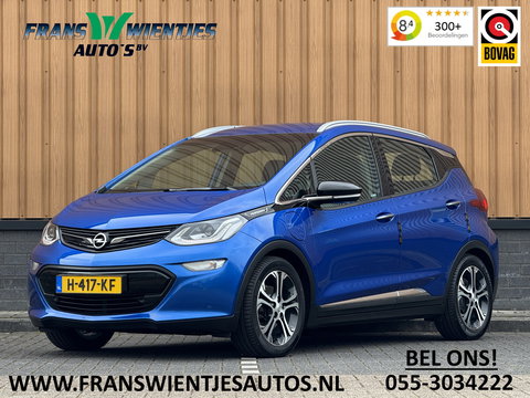 Opel Ampera-E Business executive 60 kWh | SOH 100% | Origneel Nederlands | Trekhaak | Apple Carplay | Android Auto | Stoelverwarming | Stuurwielverwarming | Bose | DAB | Camera |