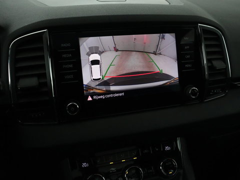 Škoda Karoq 1.5 TSI Sportline | Panoramadak | Stoelverwarming | Adaptive cruise | Camera | Sportstoelen | Virtual Cockpit | Navigatie | Sfeerverlichting | Full LED | 18'' | Keyless | Climate control