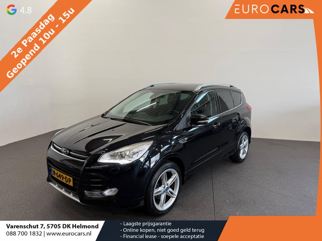Ford Kuga - 1.5 Titanium Styling Pack Trekhaak Navigatie Camera Parkeersensoren Cruise Control Stoelverwarming Xenon koplampen Half leder Climate Control Lichtmetalen velgen Getinte ramen