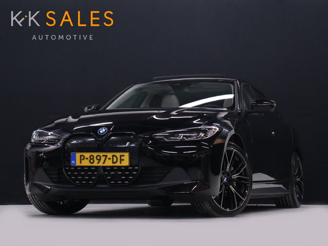 BMW i4 - eDrive40 84 kWh [SCHUIFKANTELDAK, CRUISE CONTROL, APPLE CARPLAY, ANDROID AUTO, ACHTERUITRIJCAMERA, PDC V+A,STUURVERWARMING, BMW LED, NIEUWSTAAT]
