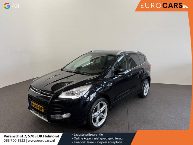 Ford Kuga - 1.5 Titanium Styling Pack Trekhaak Navigatie Camera Parkeersensoren Cruise Control Stoelverwarming Xenon koplampen Half leder Climate Control Lichtmetalen velgen Getinte ramen