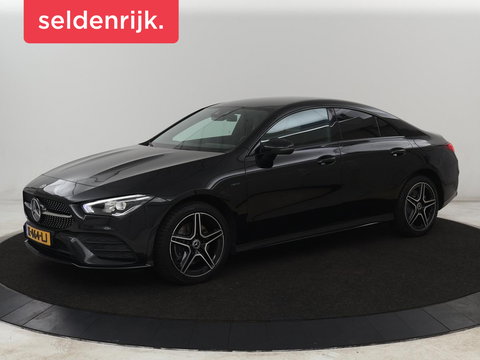 Mercedes-Benz CLA-Klasse 250e AMG | SOH 98% | Stoelverwarming | Widescreen | Sfeerverlichting | Full LED | Park Assist | Camera | Navigatie | Half leder | PHEV | Plug In