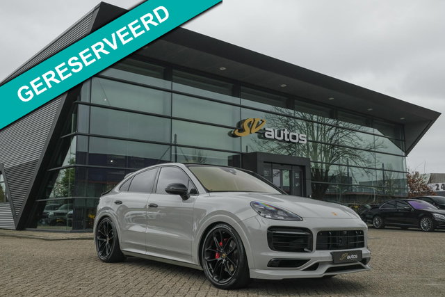 Porsche Cayenne - Coupé 3.0 E-Hybrid 462PK Krijtgrijs SportDesign Burmester Luchtvering *SOH 92%* Lightweight Package Carbon Dak 4-wielsturing NLauto