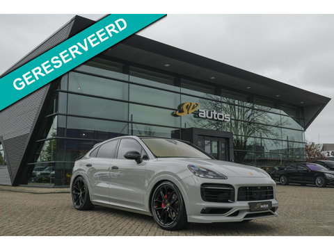 Porsche Cayenne Coupé 3.0 E-Hybrid 462PK Krijtgrijs SportDesign Burmester Luchtvering *SOH 92%* Lightweight Package Carbon Dak 4-wielsturing NLauto