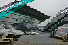 Porsche Cayenne - Coupé 3.0 E-Hybrid 462PK Krijtgrijs SportDesign Luchtvering *SOH 82%* Lightweight Package Carbon Dak 4-wielsturing NLauto