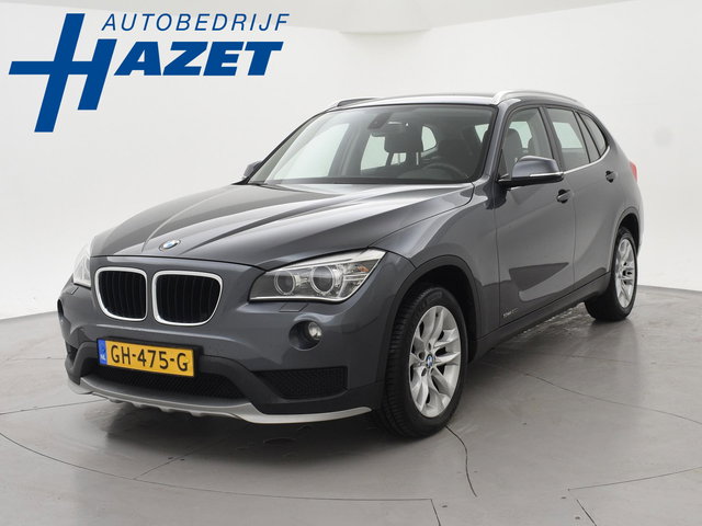 BMW X1 - sDrive20i 184 PK AUT. ORIG. NL *94.700 KM* + TREKHAAK | NAVI PRO | MINERALGRAU
