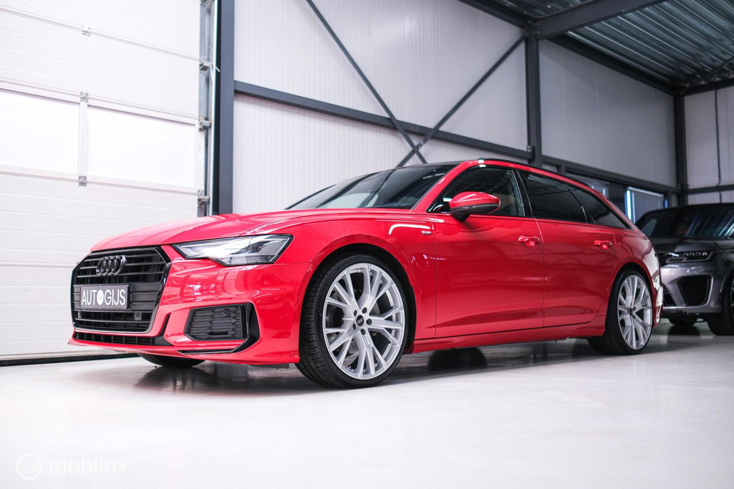 Audi A6 Avant 45 TFSI S edition 265 pk | Tango Rood | S6 look | NL auto NAP | Panoramadak | 21 inch | S line | Camera | LED |