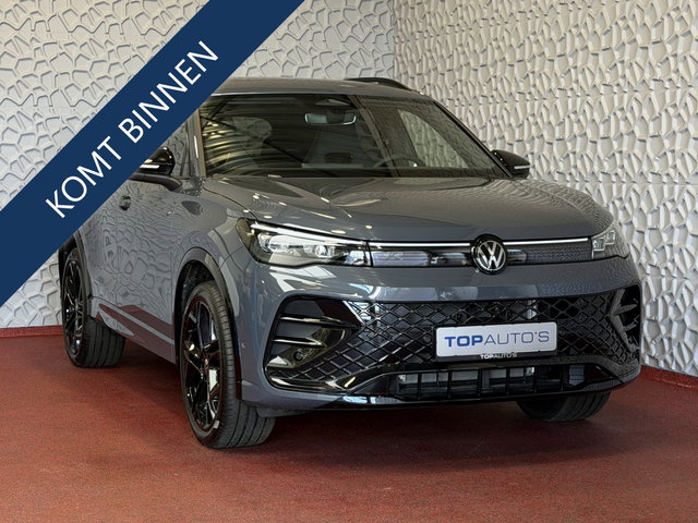 Volkswagen Tiguan - 1.5 eHYBRID 272 PK NW AUTO R-LINE VW.TREKHAAK BLACK PANO XL.NAVI STOEL/STUUR VERW. BLACK.STYLE 360.CAM ELEK.KLEP MATRIX.LED 20''LMV MASSAGE SCHUIFDAK PHEV PLUG IN HYBRID ✅Top Auto's Wijchen , 30 Jaar Specialist in Volkswagen  : Alle Type's : R-Line Editio
