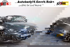 BMW 4 Serie - Cabrio M440i xDrive High-Executive 374PK Individueel-lak Navigatie  Volleder 19LMV Head up