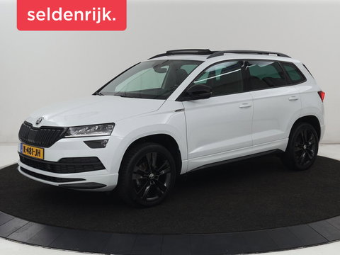 Škoda Karoq 1.5 TSI Sportline | Panoramadak | Stoelverwarming | Adaptive cruise | Camera | Sportstoelen | Virtual Cockpit | Navigatie | Sfeerverlichting | Full LED | 18'' | Keyless | Climate control