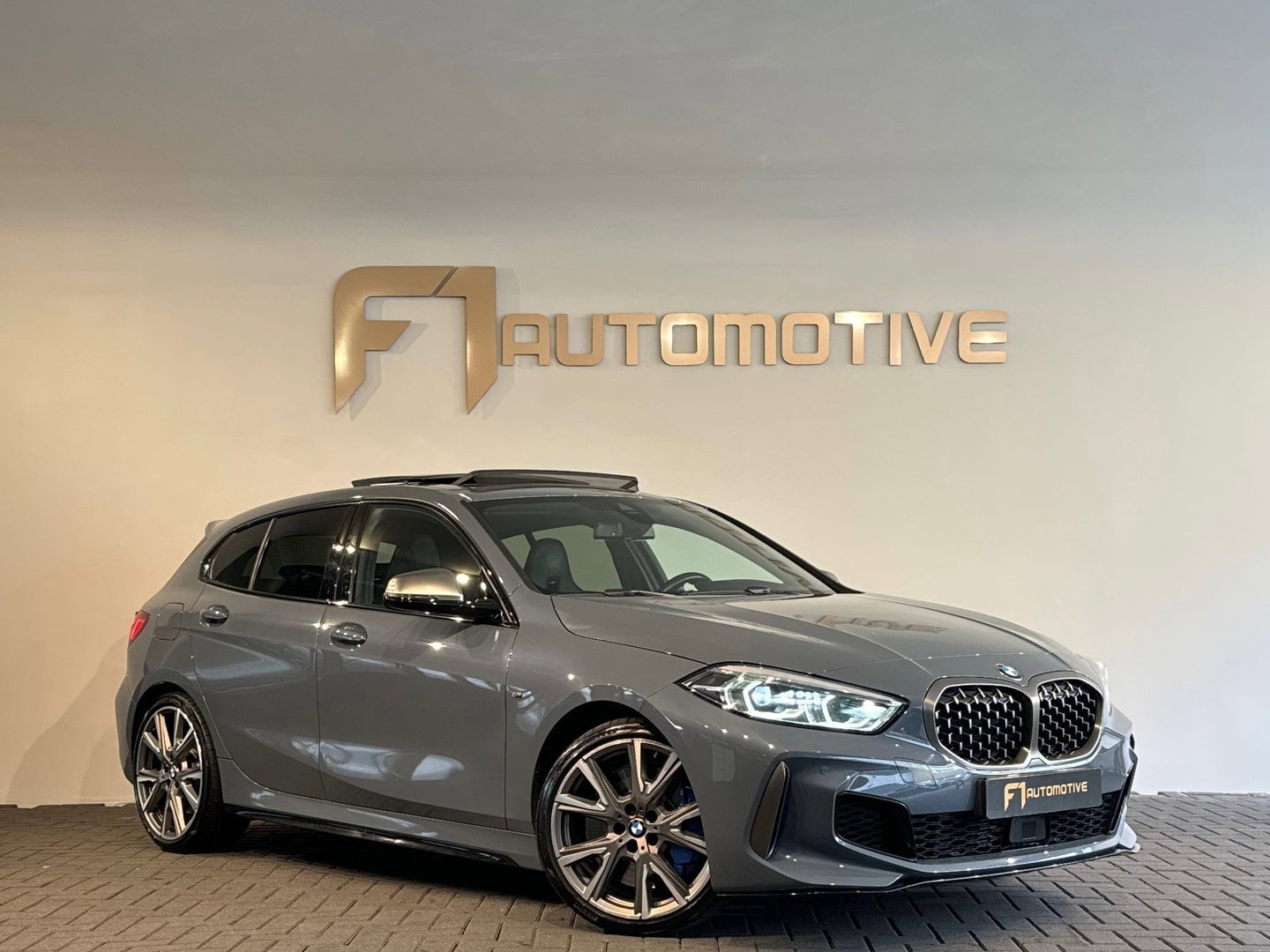 BMW 1-serie M135i xDrive High Executive Pano|Memory|HuD|H/K