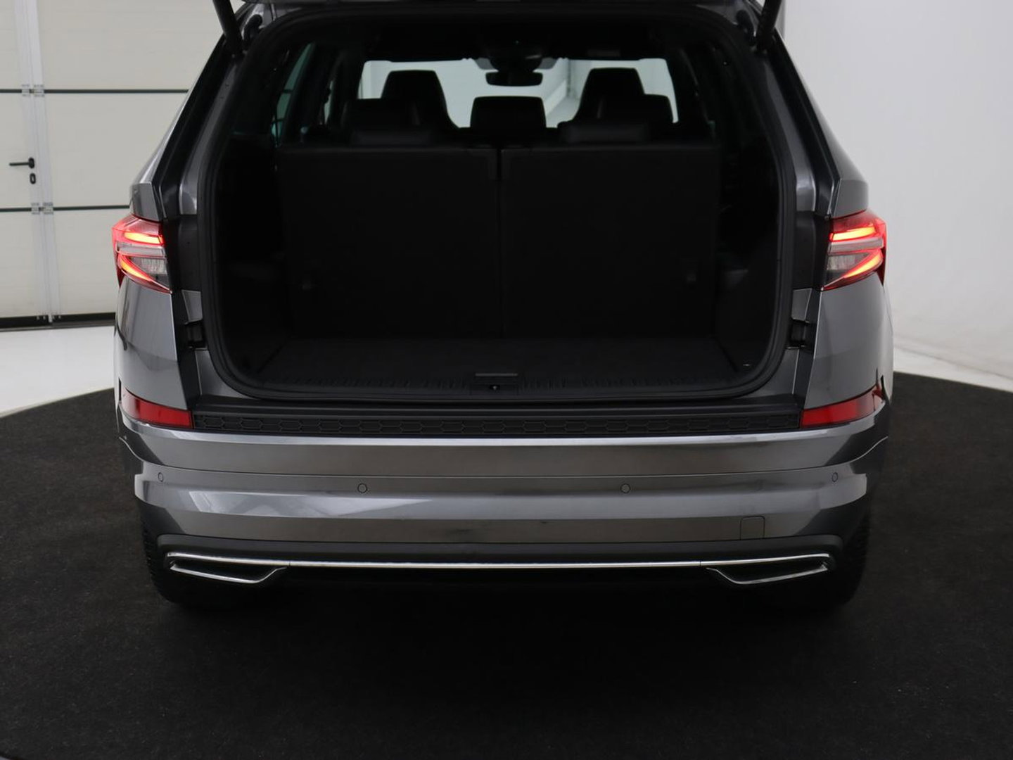 Škoda Kodiaq 1.5 TSI Sportline Business 7 Persoons | Stoelverwarming | Adaptive cruise | Alcantara | Matrix LED | Carplay | Keyless | Camera | Virtual Cockpit | Side Assist | Sfeerverlichting | Navigatie