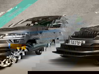 Škoda Karoq - 1.0 TSI Sport Automaat (PANORAMADAK, APPLE CARPLAY, GROOT NAVI, CLIMATE, CAMERA, STOELVERWARMING, SPORTSTOELEN, GETINT GLAS, ADAPTIVE CRUISE, NIEUWE APK, NIEUWSTAAT)