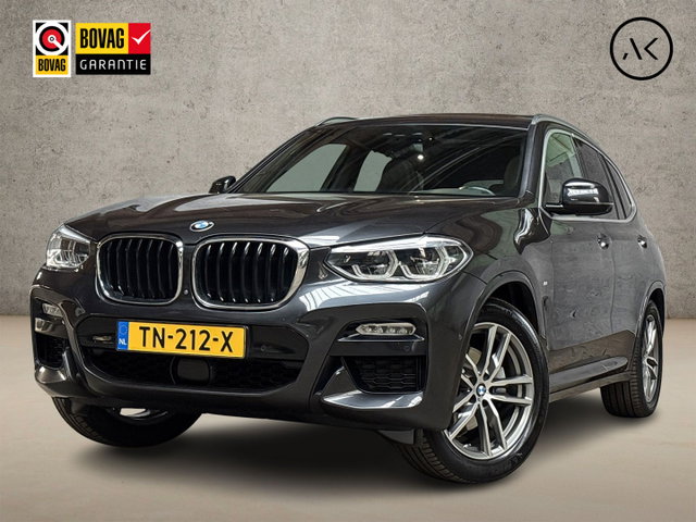 BMW X3 - xDrive20i M Sport High Executive 184Pk Automaat (PANORAMADAK, M PAKKET, GROOT NAVI, 360 CAMERA, HARMAN/KARDON, LEDER, STOELVERWARMING, ADAPTIVE CRUISE, GETINT GLAS, TREKHAAK, NIEUWSTAAT)