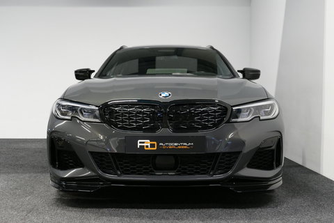BMW 3 Serie Touring 330e xDrive M Sport / M340i Diffuser /  Black Diamond M grille / M340i M Sport bumper pakket / BMW Laser Light / Panoramadak / Premium kleur Dravitgrau / Elektr. verstelbare voorstoelen links met memory / Apple Carplay - Android Auto / Stoelverwar