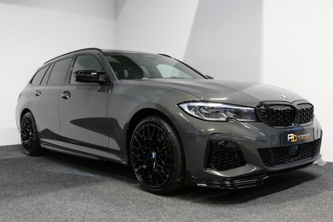 BMW 3 Serie Touring 330e xDrive M Sport / M340i Diffuser /  Black Diamond M grille / M340i M Sport bumper pakket / BMW Laser Light / Panoramadak / Premium kleur Dravitgrau / Elektr. verstelbare voorstoelen links met memory / Apple Carplay - Android Auto / Stoelverwar