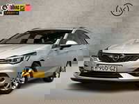 Opel Astra - Sports Tourer 1.4 Sport 146Pk Automaat (APPLE CARPLAY, NAVIGATIE, CAMERA, CLIMATE, GETINT GLAS, SPORTSTOELEN, PARKEERSENSOREN, LM VELGEN, NIEUWE APK, NIEUWSTAAT)