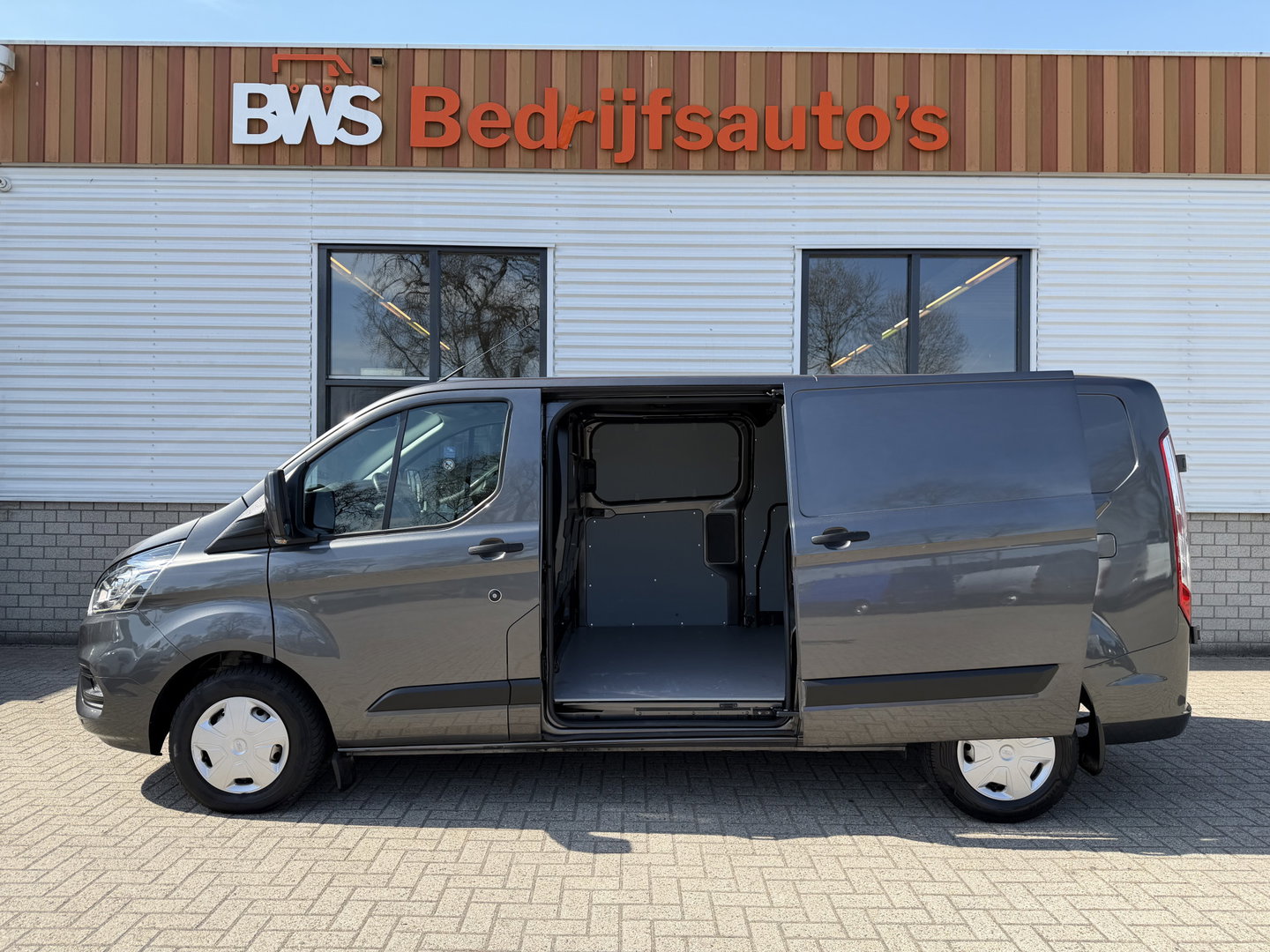 Ford Transit Custom 300 2.0 TDCI L2H1 Trend / vaste prijs rijklaar € 21.950 ex btw / dubbele schuifdeur / lease vanaf € 358 / airco / cruise / camera / pdc voor en achter / euro 6 / bpm vrij