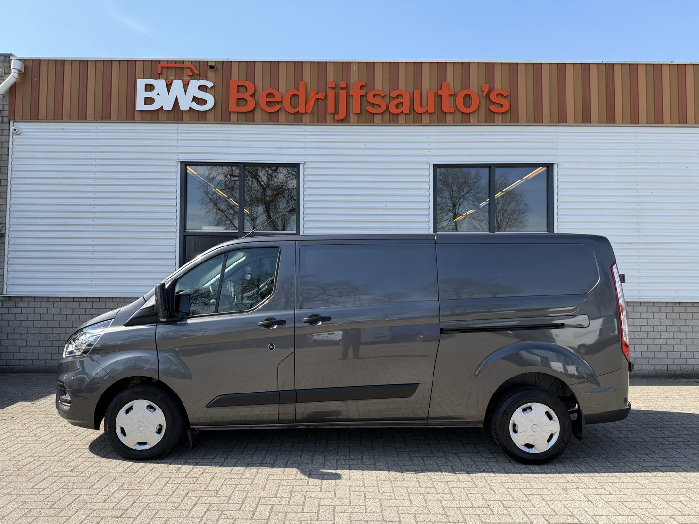 Ford Transit Custom 300 2.0 TDCI L2H1 Trend / vaste prijs rijklaar € 21.950 ex btw / dubbele schuifdeur / lease vanaf € 358 / airco / cruise / camera / pdc voor en achter / euro 6 / bpm vrij