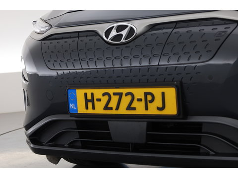 Hyundai KONA EV Premium 64 kWh | SOH 96,3% | Stoelverw./vent. | Afn. Trekhaak | Krell Audio | Camera | HUD | Adapt. Cruise