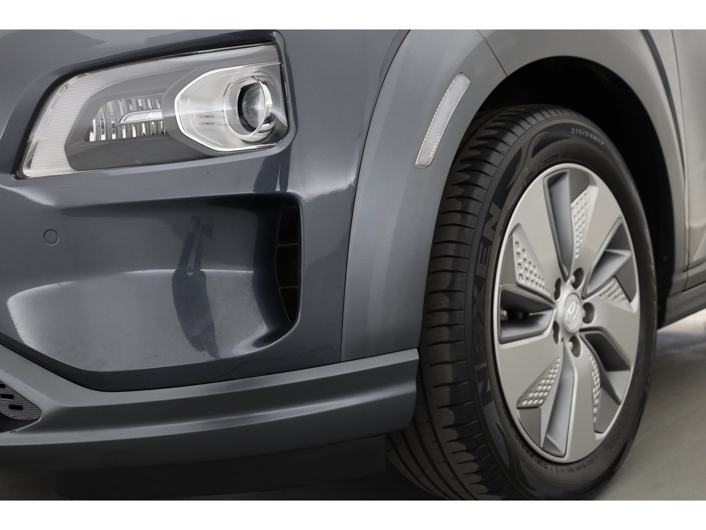 Hyundai KONA EV Premium 64 kWh | SOH 96,3% | Stoelverw./vent. | Afn. Trekhaak | Krell Audio | Camera | HUD | Adapt. Cruise