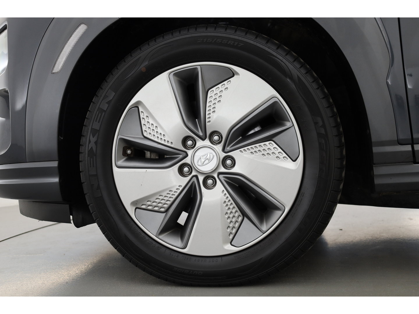 Hyundai KONA EV Premium 64 kWh | SOH 96,3% | Stoelverw./vent. | Afn. Trekhaak | Krell Audio | Camera | HUD | Adapt. Cruise