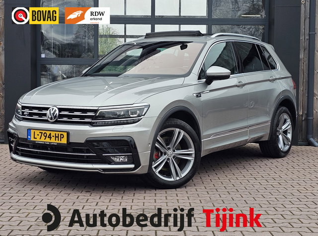 Volkswagen Tiguan - 2.0 TSI 4MOTION 220PK R-Line | Pano | HUD | Dynaudio | Leder | Stoelverwarming | 360 camera | Lane/Park/Light Assist |  Vol |