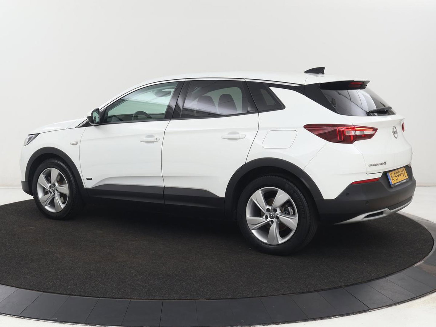Opel Grandland X 1.6 Turbo Hybrid Elegance | SOH 90,2% | Carplay | Camera | Full LED | Half leder | Navigatie | Parkeerhulp | Climate control | Bluetooth | Cruise control | 56.000km NAP | PHEV | Plug In