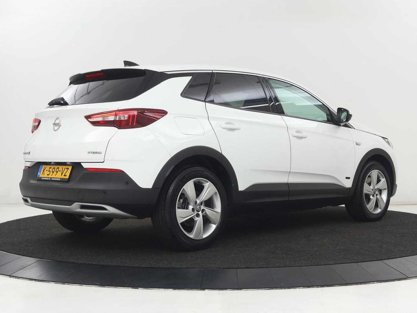 Opel Grandland X 1.6 Turbo Hybrid Elegance | SOH 90,2% | Carplay | Camera | Full LED | Half leder | Navigatie | Parkeerhulp | Climate control | Bluetooth | Cruise control | 56.000km NAP | PHEV | Plug In