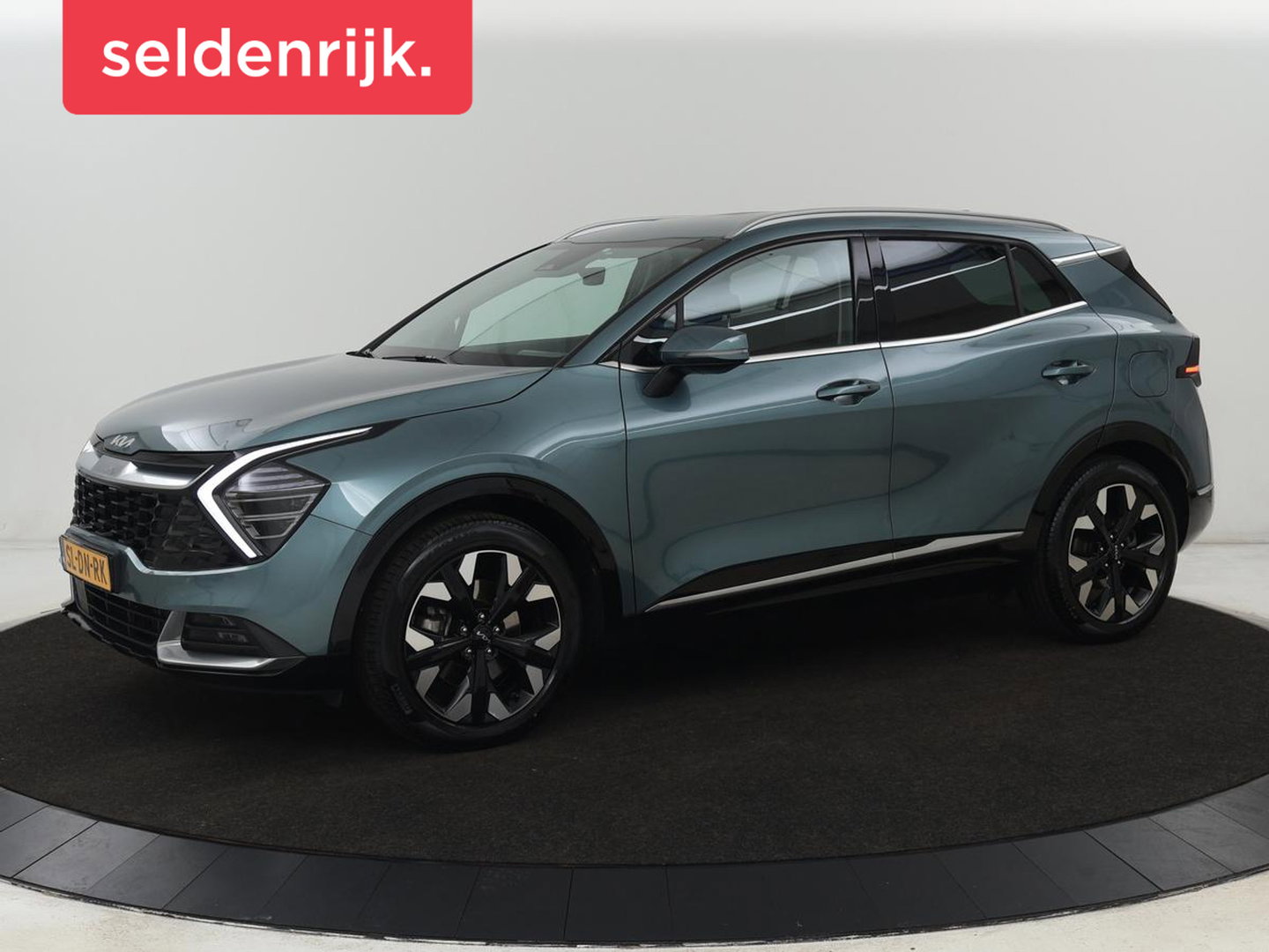 Kia Sportage 1.6 T-GDI Plug-in Hybrid AWD DynamicPlusLine | SOH 96,9% | Stoel & stuurverwarming | Half leder | Camera | Carplay | Adaptive cruise | 19'' | Navigatie | Achterbankverwarming | PHEV