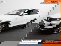 Volkswagen T-Roc - 1.5 TSI Sport R-Design Automaat Navigatie Stoelverwarming Afneembare trekhaak Sfeerverlichting LED Lichtmetalen velgen Adaptieve cruise control Apple Carplay/ Andriod Auto Digitale cockpit