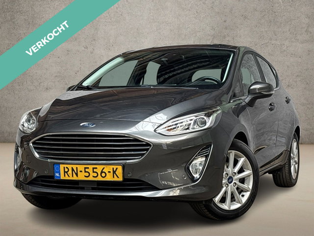 Ford Fiesta - 1.0 EcoBoost Titanium (APPLE CARPLAY, GROOT NAVI, STUUR/STOELVERWARMING, BANG&OLUFSEN, CAMERA, SPORTSTOELEN, ADAPTIVE CRUISE, LM VELGEN, NIEUWSTAAT)