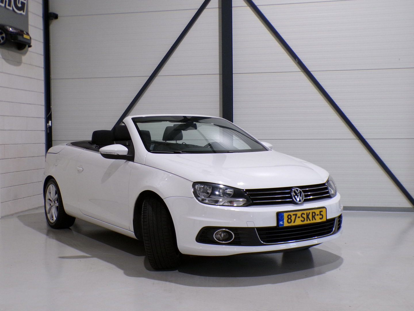 Volkswagen Eos 1.4 TSI Highline 122PK "Origineel NL!" Navigatie Bluetooth Garantie Parkeersensoren Panoramadak Multi-stuur