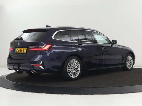 BMW 3 Serie 318i Luxury Line | Sportstoelen | Leder | Carplay | Live Cockpit | Sfeerverlichting | Trekhaak | Parkeerhulp | Climate control | Full LED | Cruise control | Bluetooth