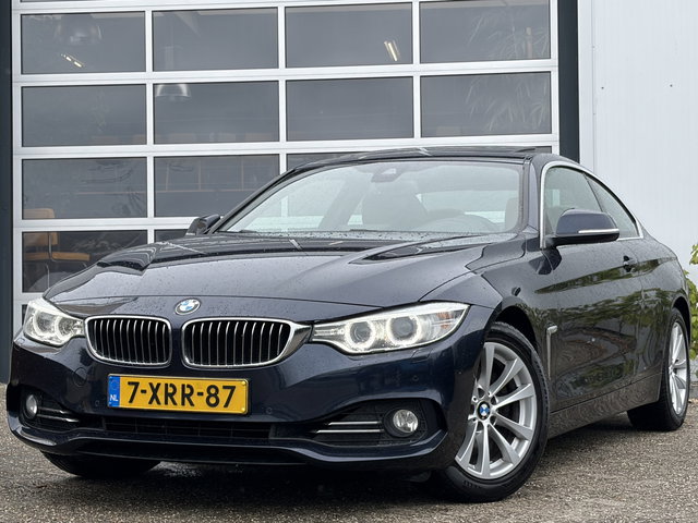 BMW 4 Serie - Coupé 428i High Executive 245pk | Achteruitrijcamera | Bi-xenon koplampen | Cruise control | Lederen bekleding | Navigatiesysteem full map | Voorstoelen verwarmd | Zeer nette auto!