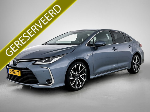 Toyota Corolla - 1.8 Hybrid Executive Sedan / Leder / Navigatie / Xenon / Pdc.V+A / Airco-ecc./ Radio multimedia / Apk 03-2027